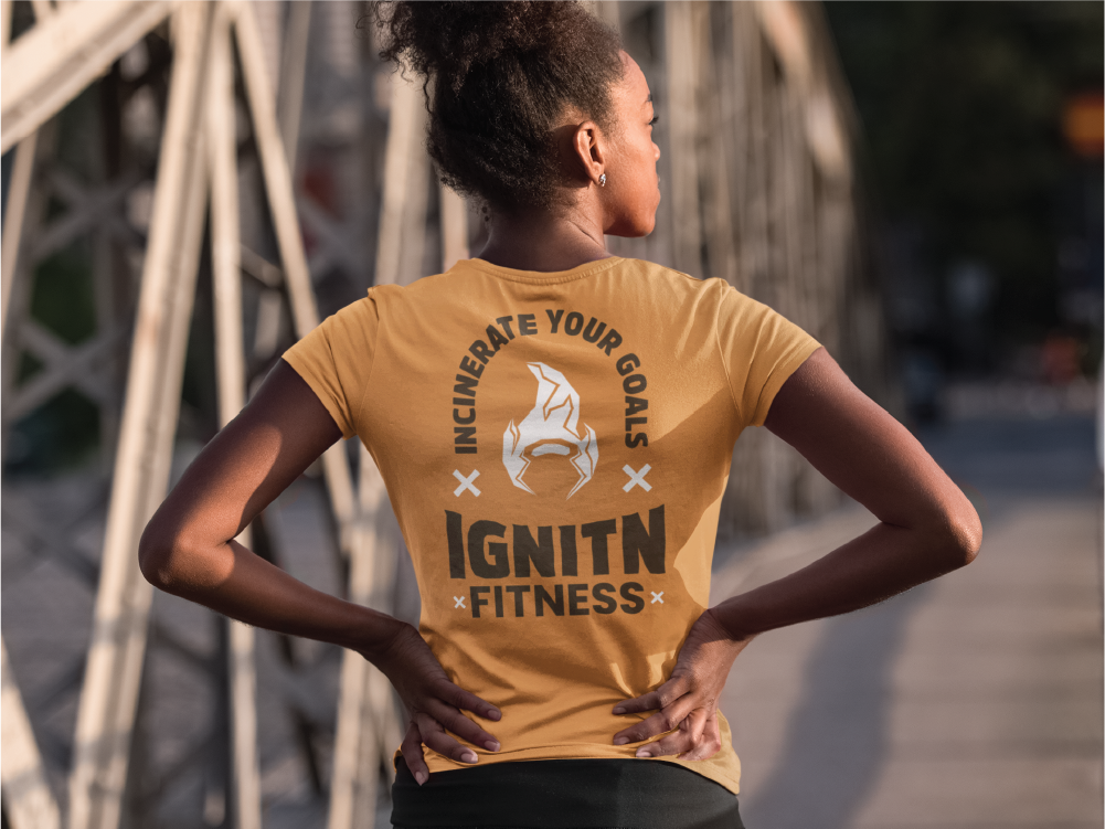 Ignitn Fitness alt logo on back of womens tshirt.